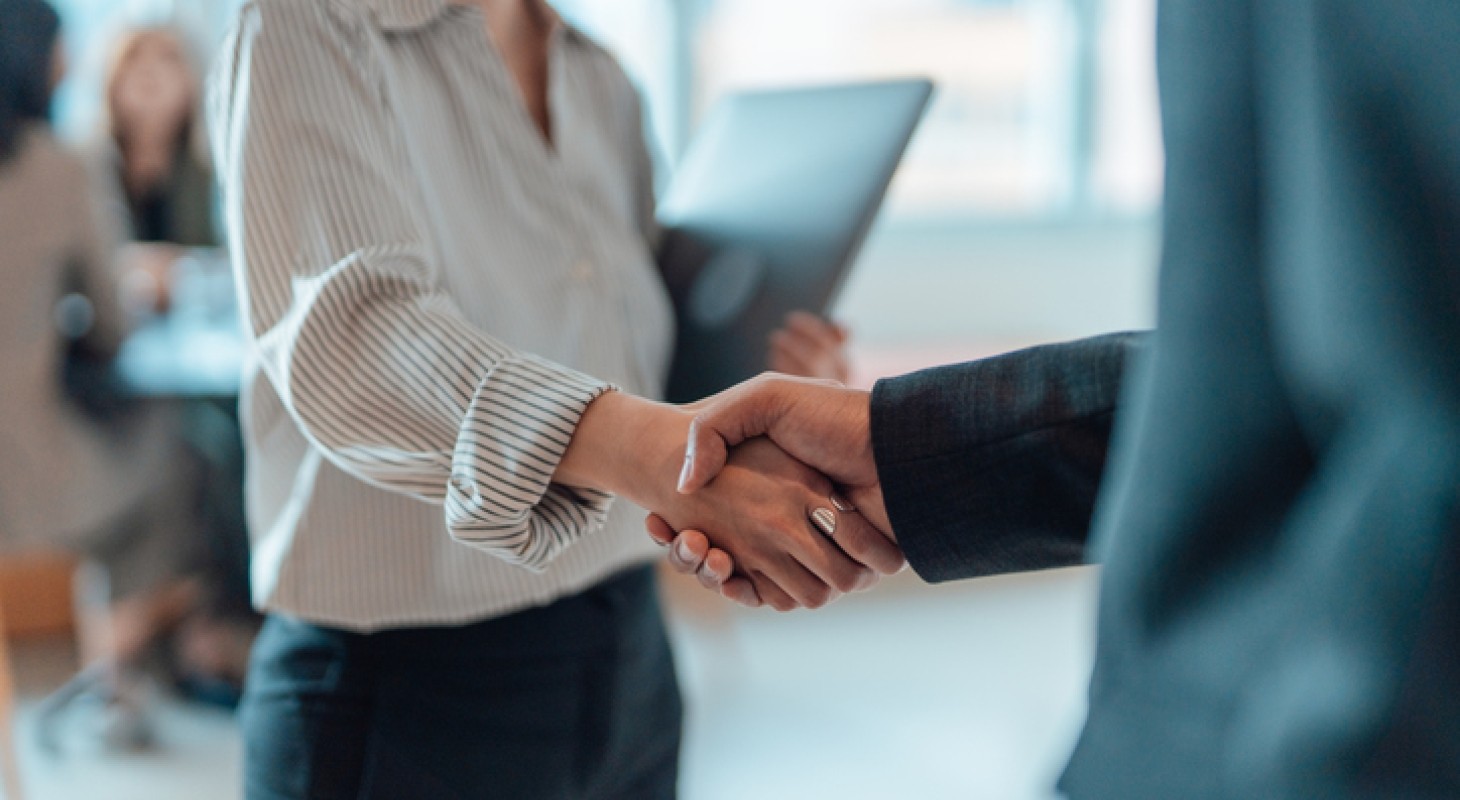 handshake for successful partnership and business agreement 