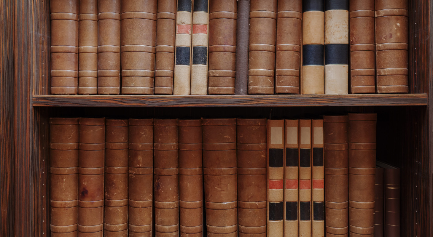 vintage law books on wooden shelves