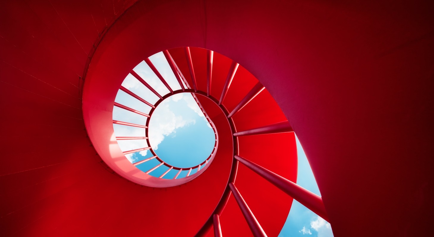 red spiral staircase against sky