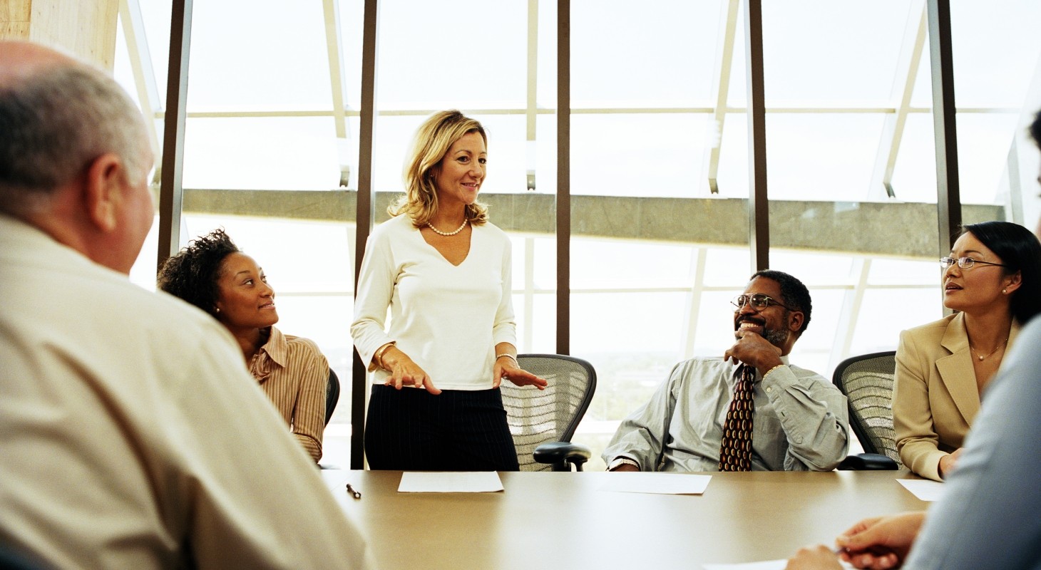 Group-of-professionals-having-meeting-in-boardroom