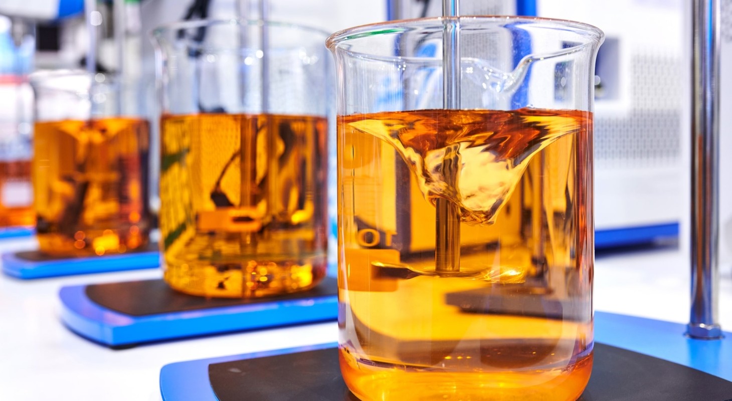 mixer stirring liquid in beaker