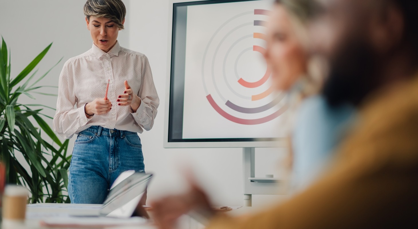 woman giving casual presentation to colleagues