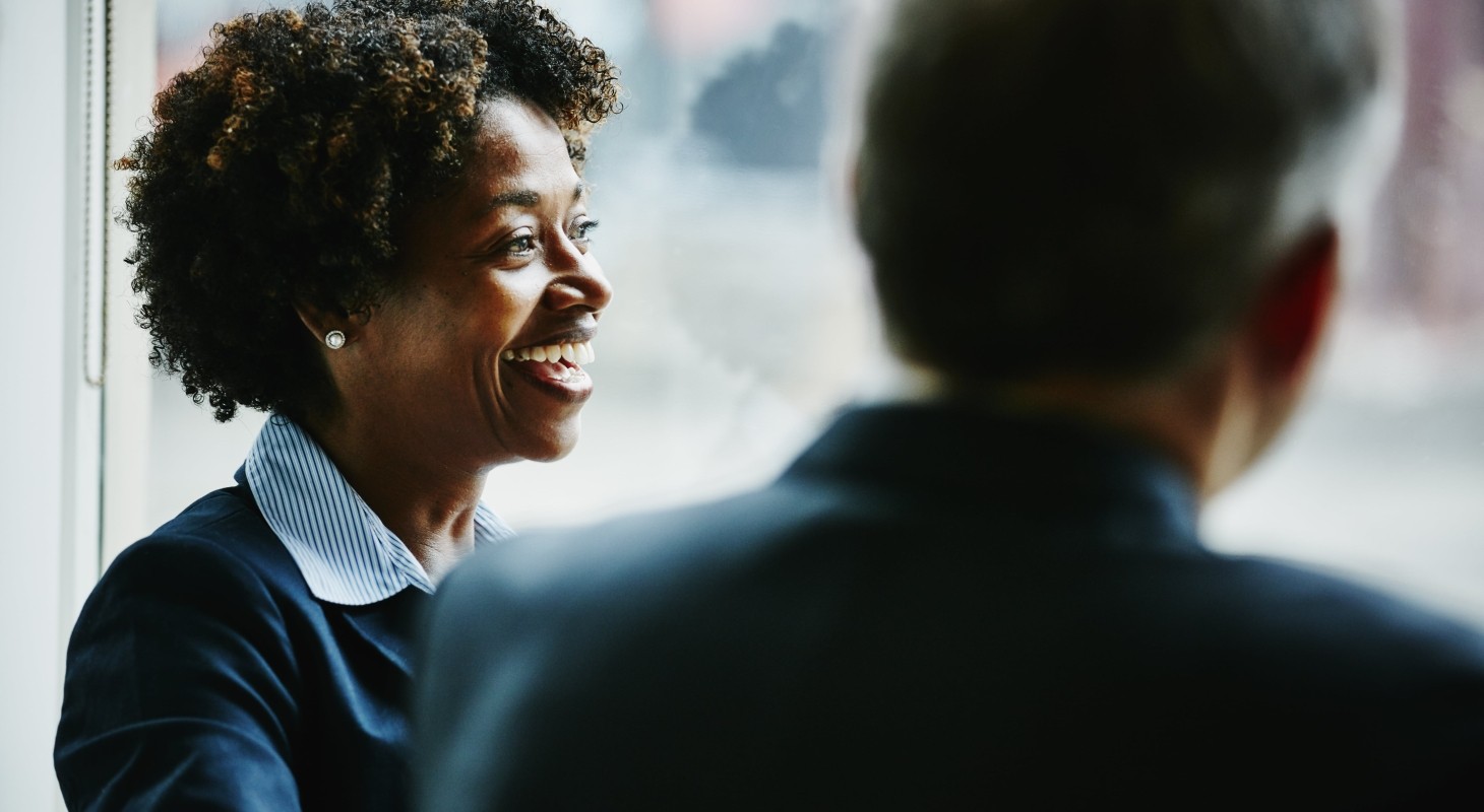 businesswoman in discussion with colleagues
