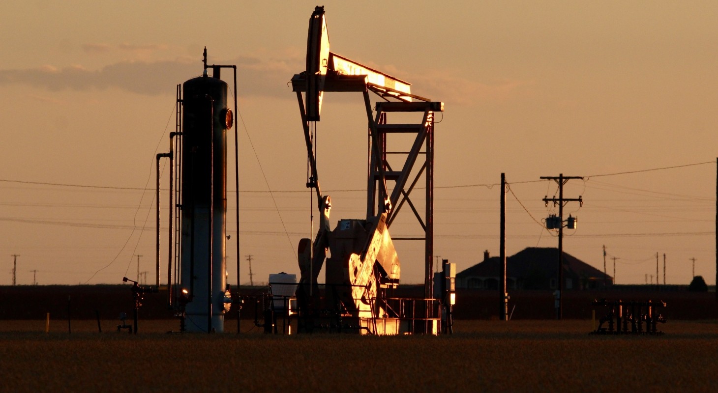 sun reflecting off pump jack