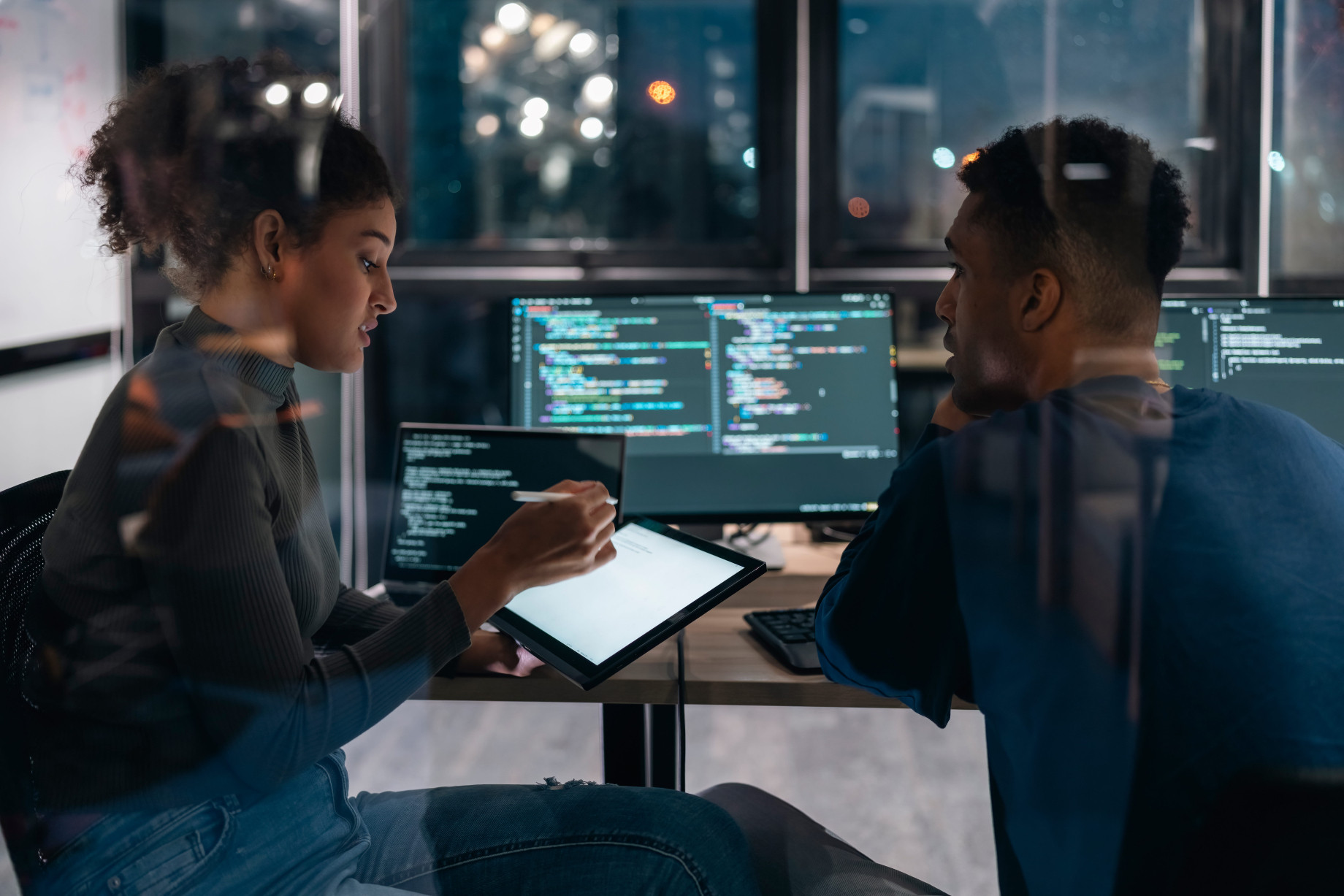two software developers in modern office