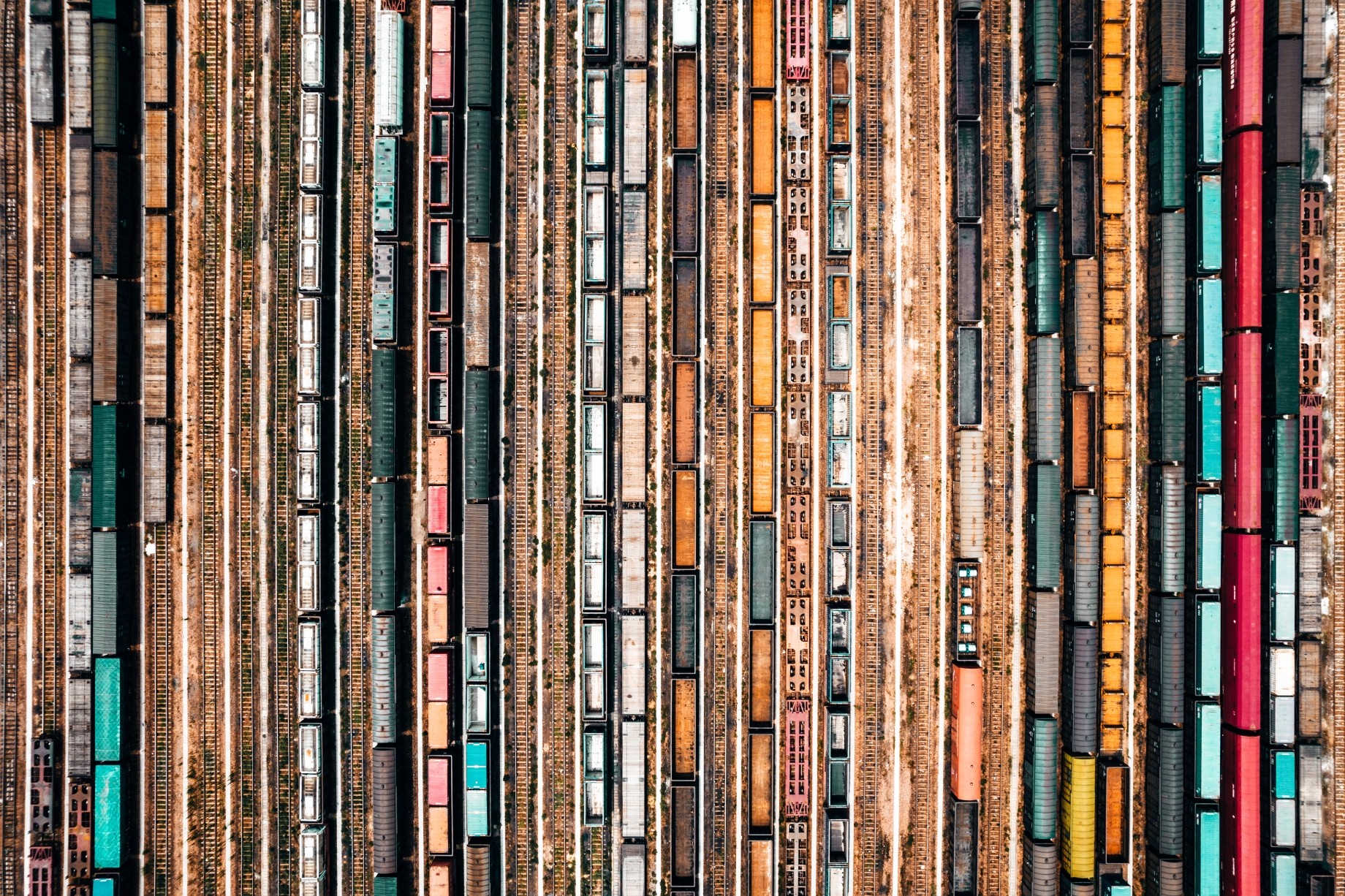 dozens of trains in railyard as viewed from directly above