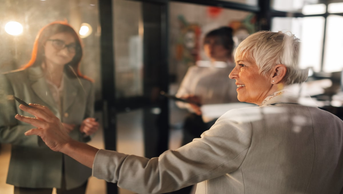 senior businesswoman working on business plan
