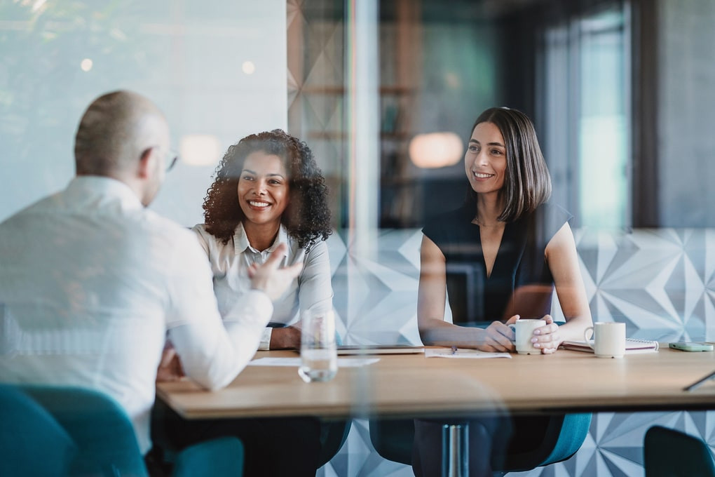 female entrepreneurs listening to a customer