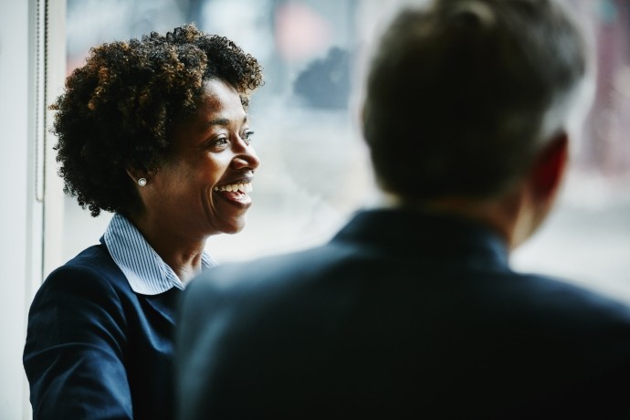 businesswoman in discussion with colleagues