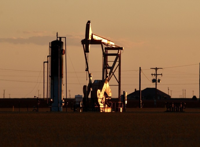 sun reflecting off pump jack