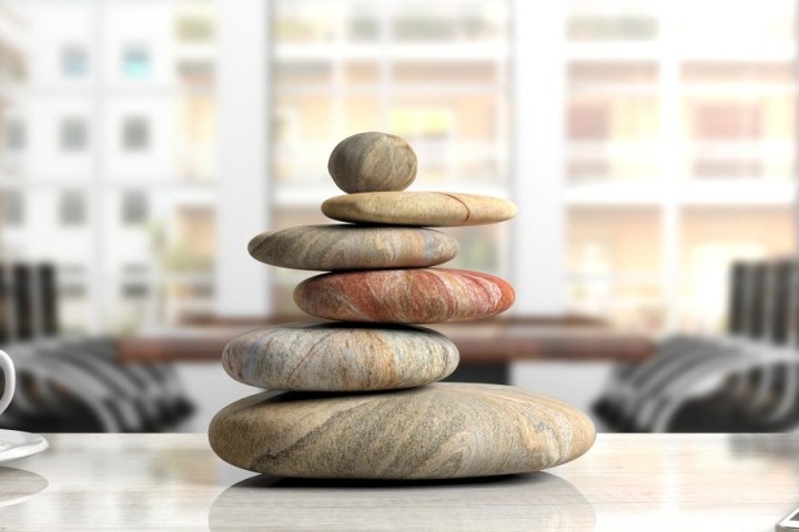 stacked-rocks-on-a-white-office-desk