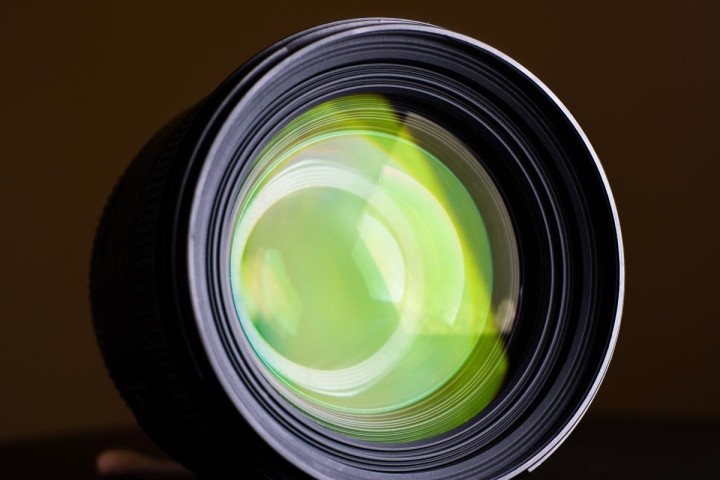 camera-lens-reflecting-lime-green-light