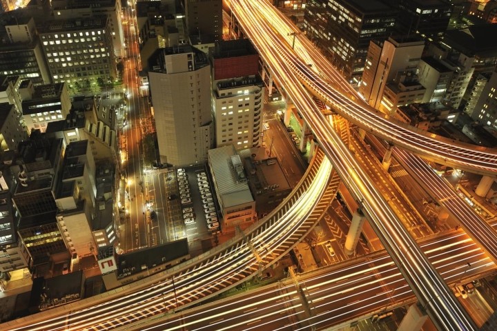 overhead view of merging highways at night