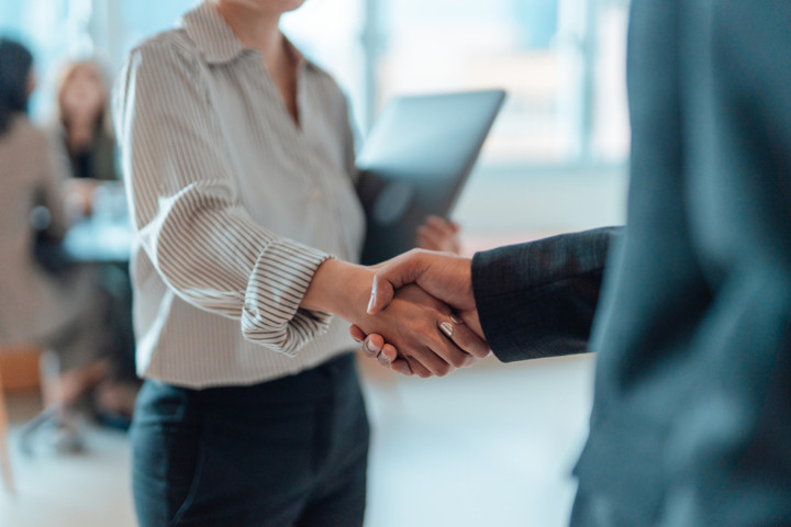 handshake for successful partnership and business agreement 