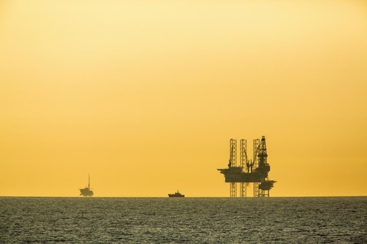 offshore-oil-rig-against-gold-sky