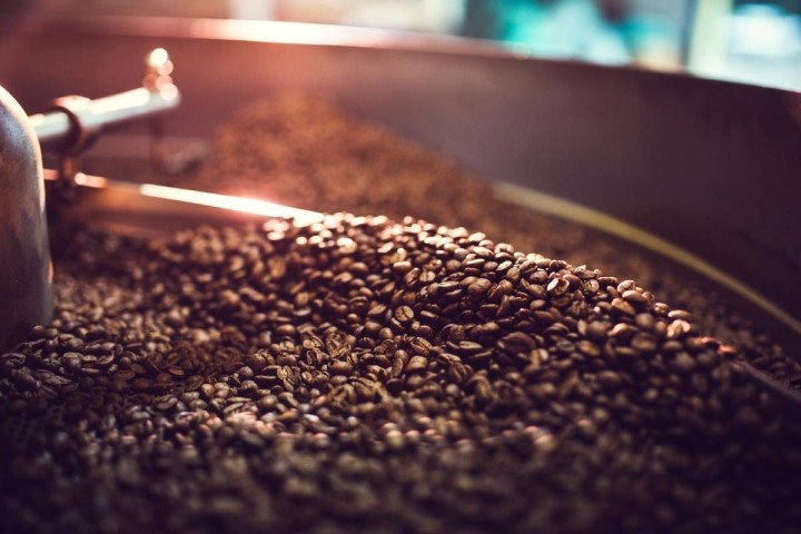 close up of coffee beans in a roaster