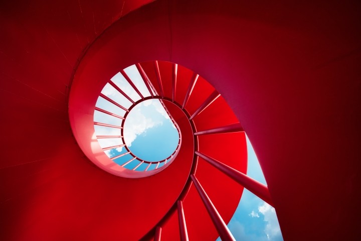 red spiral staircase against sky