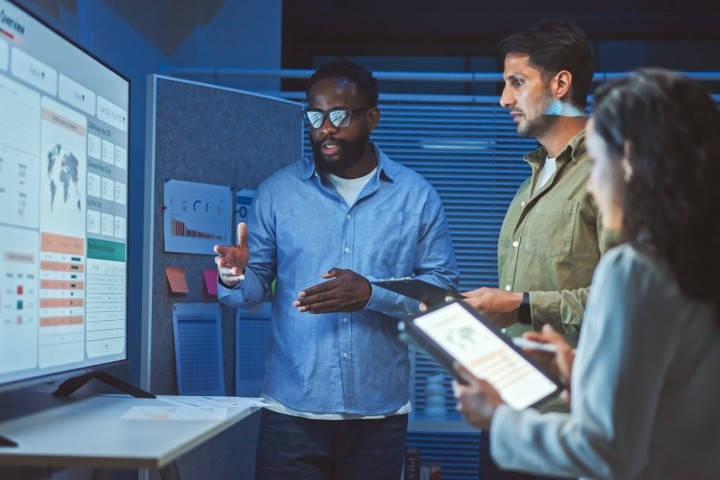 data analytics team meeting at night