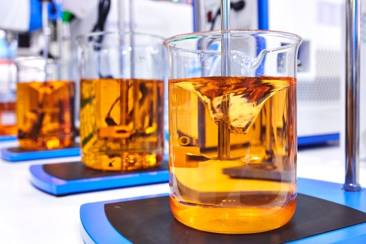 mixer stirring liquid in beaker