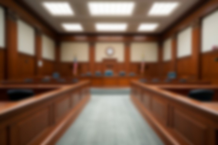 blurred background of an empty courtroom