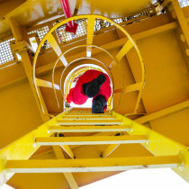 offshore oil rig worker climbing
