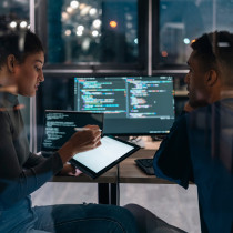 two software developers in modern office