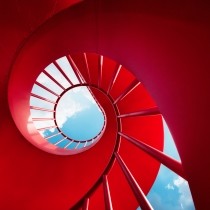 red spiral staircase against sky