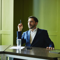 businessman listening during meeting in conference room