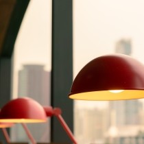 red table lamp set apart from similar lamps