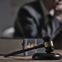 gavel and law book in front of lawyer
