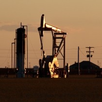 sun reflecting off pump jack