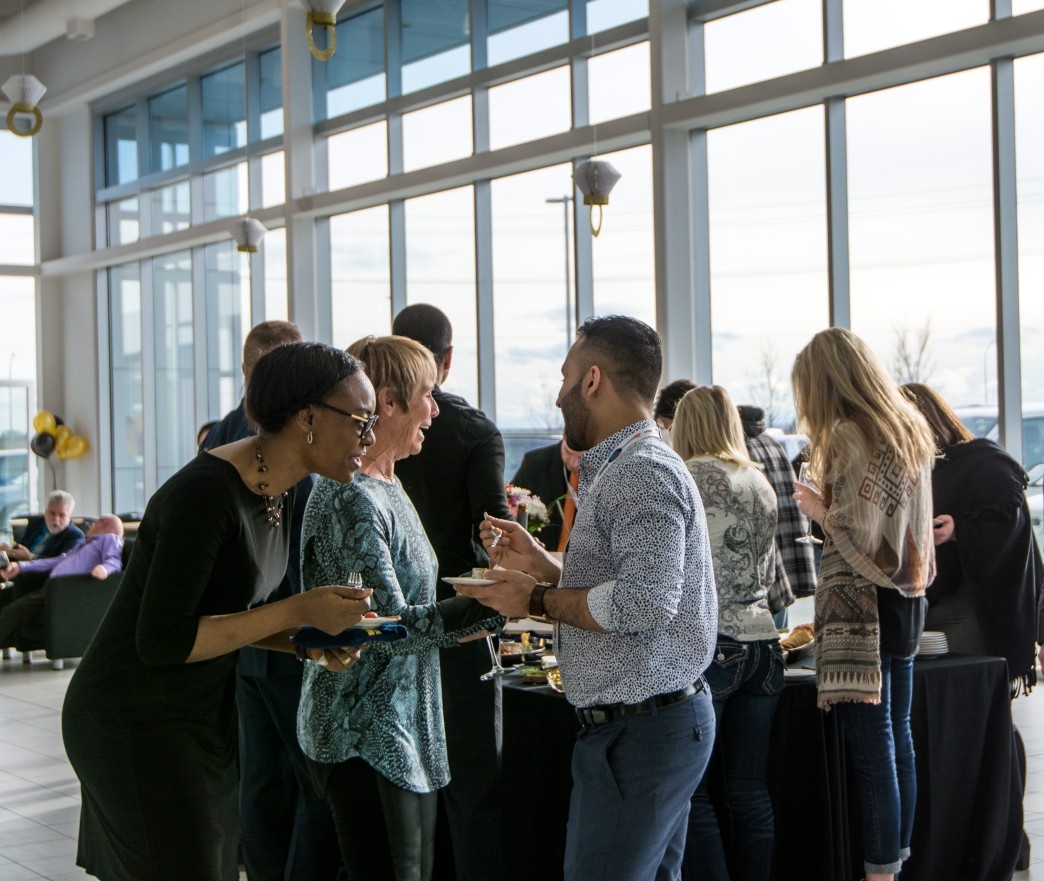 people socializing at a meeting